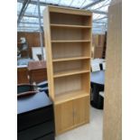 A MODERN OPEN FIVE TIER BOOKCASE WITH DOORS TO THE BASE, 30" WIDE