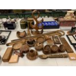 AN ASSORTMENT OF TREEN TO INCLUDE A WINE RACK AND THREE WALKING STICKS ETC