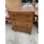 AN OAK CHEST OF FIVE DRAWERS