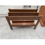 A RETRO TEAK MAGAZINE RACK