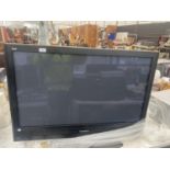 A 42" PANASONIC TELEVISION REQUIRING A POWER CABLE AND REMOTE CONTROL