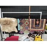 THREE VARIOUS HEARTH RUGS