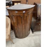 A 19TH CENTURY STYLE TWO DOOR BOWFRONTED CORNER CUPBOARD, 25.5" WIDE, WITH SHAPED INTERIOR SHELVES