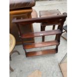 A MAHOGANY FOUR TIER WALL SHELF