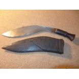 A KUKRI KNIFE, 32CM BLADE, WITH LEATHER SCABBARD