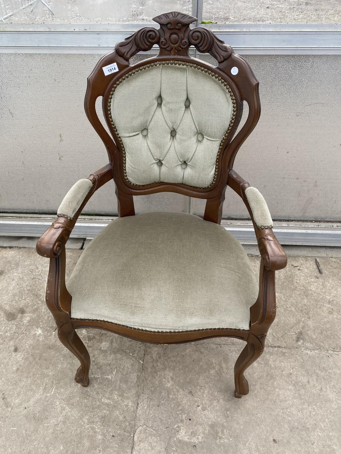A MODERN CONTINENTAL STYLE OPEN ARMCHAIR WITH BUTTON-BACK