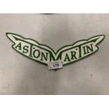 AN ASTON MARTIN CAST METAL PAINTED WALL PLAQUE