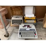 THREE VINTAGE TYPE WRITERS TO INCLUDE A BOOTS PT800, A REMINGTON AND A PETITE INTERNATIONAL