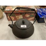 A CAST IRON FIRESIDE KETTLE