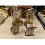 FOUR CLOCKS TO INCLUDE A CASED BENTIMA ANNIVERSARY CLOCK, A BRASS ESTYMA CLOCK, A SMALL CERAMIC