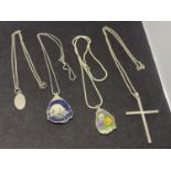 FOUR SILVER NECKLACES WITH PENDANTS TO INCLUDE AN INGOT, CAT DESIGN, PANSIES AND A CROSS ALL MARKED