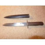 A FIGHTING KNIFE, 17CM BLADE STAMPED 43, COMPLETE WITH METAL SCABBARD