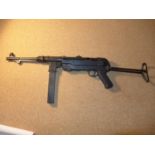 A REPRODUCTION, NON FIRING DENIX GERMAN MP40 SCHMEISSER SUB MACHINE GUN WITH FOLDING STOCK, LENGTH