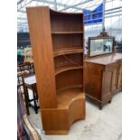 A RETRO TEAK G-PLAN CORNER UNIT ENCLOSING FOUR OPEN SHELVES AND CUPBOARD TO THE BASE, 43" WIDE