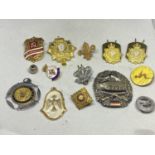 A COLLECTION OF VARIOUS BADGES