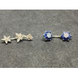 TWO SILVER BELLY BUTTON BARS WITH COLOURED STONE FLOWER DESIGN
