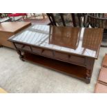 A MAHOGANY COFFEE TABLE WITH THREE DRAWERS, LOWER SHELF AND GLASS TOP