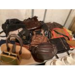 A LARGE ASSORTMENT OF VINTAGE AND RETRO HANDBAGS, SOME LEATHER