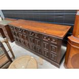 A YOUNGER TOLEDO SIDEBOARD WITH FOUR DOORS AND FOUR DRAWERS - 70" WIDE