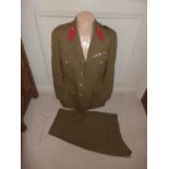 A ROYAL TANK REGIMENT OFFICERS UNIFORM COMPRISING A JACKET WITH MEDAL RIBBONS FOR MILITARY CROSS