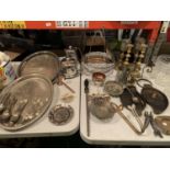A LARGE QUANTITY OF METAL WARE TO INCLUDE THREE SILVER PLATED TRAYS, CANDLE STICKS ETC.