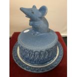A BLUE STUDIO POTTERY CHEESE DISH WITH MOUSE DESIGN