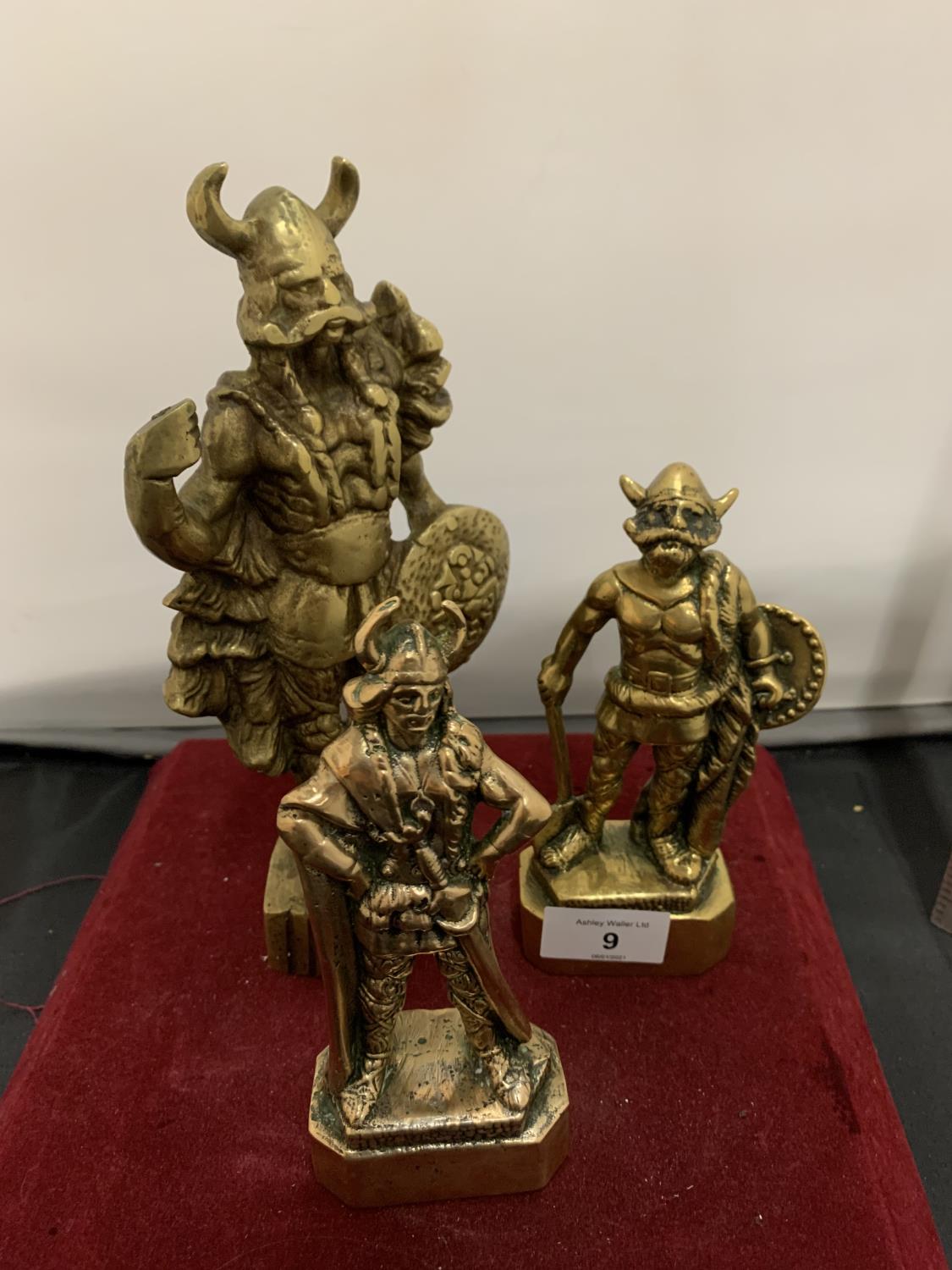 A TRIO OF HEAVY BRASS VIKING FIGURINES