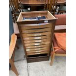 AN OFFICE STORAGE TEN DRAWER CHEST WITH ROLLER SHUTTER (NO TOP)