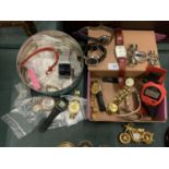 AN ASSORTMENT OF WRISTWATCHES AND VARIOUS WATCH PARTS