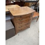 A 19TH CENTURY STYLE BOW FRONT INLAID MAHOGANY CHEST OF FOUR DRAWERS WITH DRESSING SLIDE - 29" WIDE