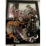A MODERN DISPLAY CASE CONTAINING AN ASSORTMENT OF COSTUME JEWELLERY