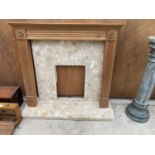 A MARBLE FIRE SURROUND AND HEARTH AND A FURTHER WOODEN SURROUND AND MANTEL