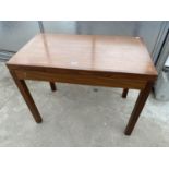 A RETRO TEAK FOLD-OVER GAMES TABLE, 36" WIDE