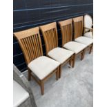 FOUR MODERN OAK DINING CHAIRS