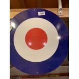 A METAL TARGET/BULLSEYE MAN CAVE SIGN