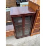 A MODERN MAHOGANY TWO DOOR STEREO CABINET