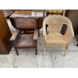 AN UNUSUAL OAK LOW ELOW CHAIR AND WICKER CHAIR