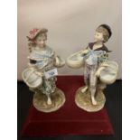TWO FIGURINES OF A BOY AND GIRL