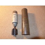 A DEACTIVATED 2" MORTAR SHELL AND CANNISTER DATED 1962