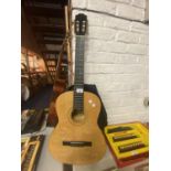 A BURSWOOD ACOUSTIC GUITAR WITH CANVAS CARRY CASE