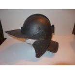 A COPY OF A 17TH CENTURY ENGLISH CIVIL WAR HELMET WITH CHEEK GUARDS AND PLUME HOLDER