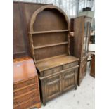 AN OLD CHARM DUTCH DRESSER WITH TWO DOORS, TWO DRAWERS AND ARCHED PLATE RACK