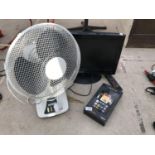 A KINDLE FIRE, A TELEVISION AND A TABLE FAN IN WORKING ORDER