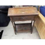 A CARVED OAK JACOBEAN STYLE SIDE TABLE