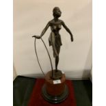 A BRONZE FIGURINE IN THE FORM OF AN ART DECO DANCER ON A MARBLE BASE SIGNED D ALONZO HEIGHT 49CM