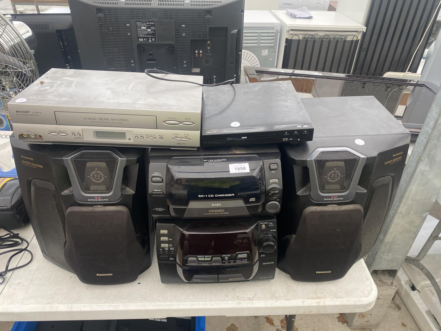 A LARGE PANASONIC HIFI SYSTEM WITH SUPER WOOFER SPEAKERS AND A FURTHER DVD PLAYER AND VHS BELIEVED