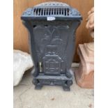 A LARGE DECORATIVE GAS HEATER