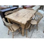 A VICTORIAN STYLE PINE KITCHEN TABLE ON TURNED LEGS, 60x36", TOGETHER WITH EIGHT CHAIRS