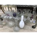A LARGE QUANTITY OF ASSORTED GLASS WARE TO INCLUDE VASES AND SERVING BOWLS ETC