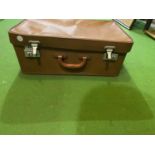 A SMALL VINTAGE SUITCASE WITH UNUSUAL HANDLE 'MADE IN ENGLAND'